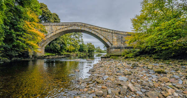 Down by the river, next to Featherstone Bridge.
